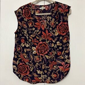 Ladies V Neck multi color blouse. Medium